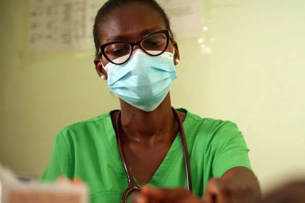 A healthworker in Ghana