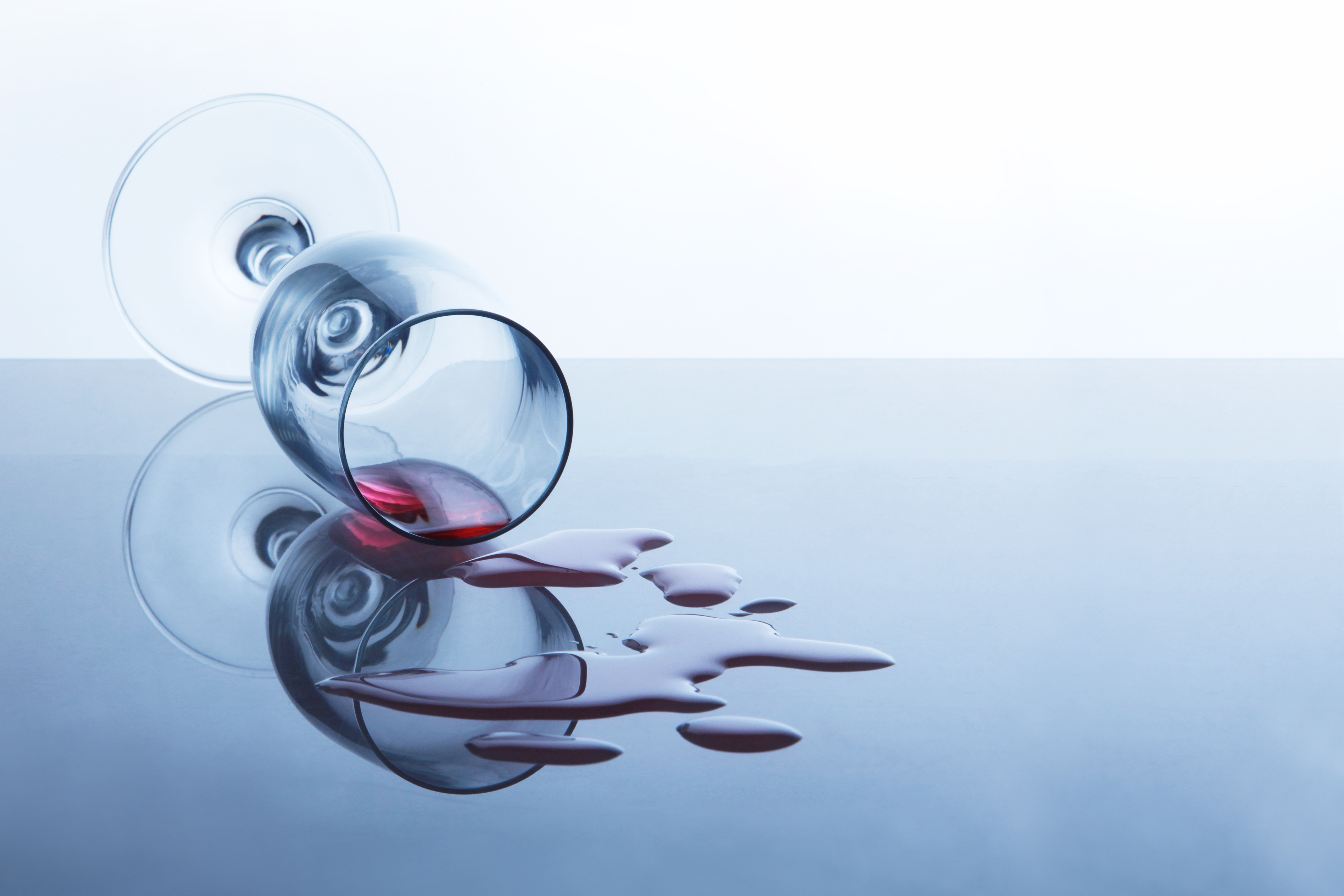 spilt glass of alcohol wine spilt glass of alcohol wine