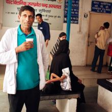Hari Singh, 42, now cured of TB, takes a break from his job as a nurse for TB patients in Jag Pravesh Chand hospital in New Delhi © Javier Galeano/The Union