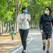 Couple running in park
